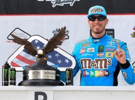 Kyle Busch put in a dominant performance at Pocono Raceway to pick up his fourth win of the NASCAR season. (Image: Chris Trotman/Getty)