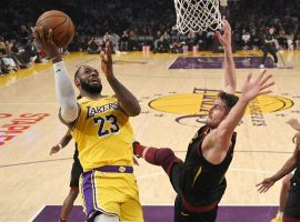 LeBron James of the LA Lakers drives to the basket against Kevin Love of the Cleveland Cavaliers during a game at Staples Center in Los Angeles. (Image: AP)