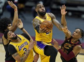 LA Lakers star LeBron James, seen here driving the lane against the Cleveland Cavs, put on a shooting clinic against his former team with a 46-point explosion. (Image: Tony Dejak/AP)