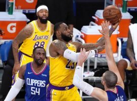 LA Lakers star LeBron James drives to the basket against the LA Clippers on opening night of the NBA season. The Lakers and Clippers have the leagueâ€™s top records four weeks into the season. (Image: Kirby Lee/USA Today Sports)