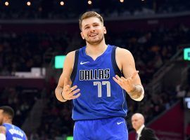 Luka Doncic smiles after knocking down a 3-pointer for the Dallas Mavericks. (Image: Jason Miller/Getty)