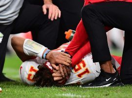 Kansas City Quarterback Patrick Mahomes goes down with an injured right knee against the Denver Broncos in Denver, CO. (Image: Ron Chenoy/USA Today Sports)