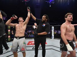 Demian Maia (left) defeated Ben Askren (right) in Singapore on Saturday in a battle between two of the worldâ€™s top grapplers. (Image: Jeff Bottari/Zuffa/Getty)