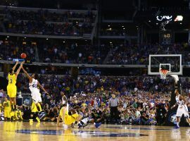 The NCAA announced it will move its 3-point line for menâ€™s play back to the international standard of 22 feet, 1.75 inches. (Image: Ronald Martinez/Getty)