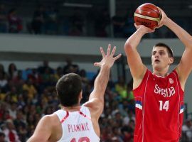 Nikola Jokic take a shot for Team Serbia in a FIBA World Cup qualifier. (Image: Jeff Swinger/USA Today Sports)