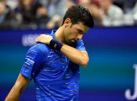 Already down two sets and a break, Novak Djokovic retired from his fourth-round US Open match vs. Stan Wawrinka due to a shoulder injury. (Image: Reuters)