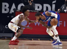 Collin Sexton of the Cleveland Cavs is seen here guarding Paul George from the LA Clippers. The Clippers face two elite squads this weekend with games against the Brooklyn Nets and Utah Jazz. (Image: Getty)