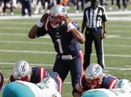 Quarterback Cam Newton runs a red zone offense for the New England Patriots against the Miami Dolphins in Week 1. (Image: Winslow Townson/AP)