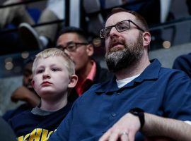 Gregg Nigl (right) had the final perfect bracket for this yearâ€™s NCAA Tournament until Tennessee lost on Thursday night. (Image: Junfu Han/Detroit Free Press)