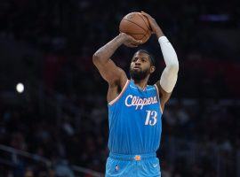 Paul George shoots a free throw for the LA Clippers in December before he suffered an UCL elbow injury. (Image: Getty)