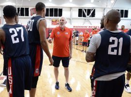 Team USA head coach Gregg Popovich chats with players during a practice in Las Vegas. (Image: Getty)