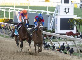 Swiss Skydiver (4) passing Authentic in deep stretch provided a memorable 2020 Preakness -- that no fans watched live due to COVID. Pimlico announced Tuesday it will sell 10,000 tickets to the 146th Preakness May 15 at Pimlico. (Image: Tommy Gilligan/USA TODAY Sports)