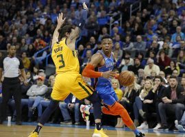 Russell Westbrook from the Oklahoma City Thunder drives by Ricky Rubio from the Utah Jazz at Chesapeake Energy Center in Oklahoma City. (Image: Alonzo Adams/USA Today Sports)