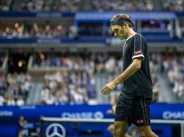 Roger Federer struggled with upper back and neck pain before losing in five sets to Grigor Dimitrov in the US Open quarterfinals on Tuesday. (Image: Tim Clayton/Corbis/Getty)