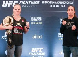 Valentina Shevchenko (left) will defend her womenâ€™s flyweight title vs. Liz Carmouche (right) at UFC Fight Night 156. (Image: Alexandre Schneider/Zuffa)