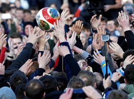 The annual Royal Shrovetide Football match is underway in Ashbourne, England. (Image: Toby Melville/Reuters)