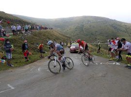 Nans Peters (ALM) fends off Ilnur Zakarian in the Pyrenees to win Stage 8 of the Tour de France. (Image: AP)