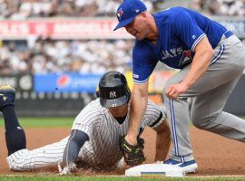 NY Yankees outfielder Giancarlo Stanton injured his knee while sliding into third base against the Blue Jays at Yankee Stadium. (Image: Kathleen Malone-Van Dyke/Newsday)