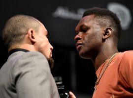 Robert Whittaker (left) will fight Israel Adesanya (right) for the undisputed UFC middleweight title at UFC 243 on Sunday. (Image: Chris Unger/Zuffa/Getty)