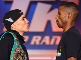 Oscar Valdez (left) will defend his WBC super featherweight title against Robson Conceicao (right) in a rematch of a 2009 amateur championship fight. (Image: Mike Williams/Top Rank/Getty)