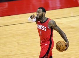 John Wall from the Houston Rockets directing floor traffic in a recent loss before his hamstring injury. (Image: Carmen Maldonado/Getty)