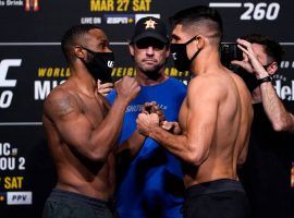 Vincente Luque (right) says he wonâ€™t underestimate former champion Tyron Woodley (left) at UFC 260. (Image: Jeff Bottari/Zuffa)