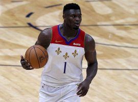 Zion Williamson dribbles up the court in a victory for the New Orleans Pelicans over the Golden State Warriors in his final game of the season before a finger injury prematurely ended his season. (Image: Sean Gardner/Getty)