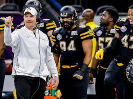 Appalachian State Mountaineers head coach Mark Ivey and his players celebrate their 45-13 victory over Middle Tennessee State. (Image: Stephen Lew/USA Today Sports)