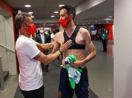 Spain captain Sergio Busquets and manager Luis Enrique talking after the 0-0 draw in the friendly game against Portugal last week. (Image: Twitter / @sefutbol)