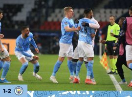 Manchester City's players celebrate after scoring the goal that put them 2-1 ahead in Paris, against PSG, in the Champions League semifinals first leg. (Image: Twitter / @ManCity )