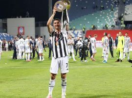 Cristiano Ronaldo poses with the Italian Cup. Juventus beat Atalanta 2-1 to lift their only trophy this season. (Image: Twitter / @JuventusFC)