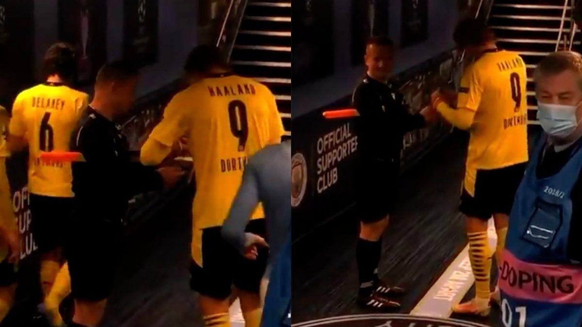 Erling Haaland signing Sovre's cards after Man City - Dortmund in the Champions League