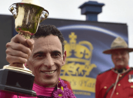 Jockey John Velazquez holding the Queen's Plate Trophy after filly Wonder Gadot's 2018 triumph. (Image: AP)