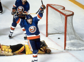 Where the turf meets the ice. Iconic moments like Mike Boy Hall of Fame sniper, who racked up 64 goals during the regular season and 17 more in the playoffs, terrorized the Canucks with seven in the Islanders' sweep of the series. Here, the 1982 playoff MVP exults after beating Vancouver goalie Richard Brodeur for one of his two power play tallies in the Isles' 3-1 win in Game 4 that made them the first U.S.-based team to win three consecutive Stanley Cups.