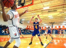 Lake Braddock guard Jimmy Anderson pressures an inbound pass from West Springfield in a Virginia high school basketball game. (Image: Will Newton/Washington Post)