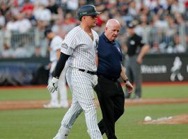 Yankees 1B Luke Voit talks to a trainer after he strained his abdominal muscle during a game against the Boston Red Sox during the London Series at London Stadium. (Image: AP)