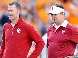 Oklahoma head coach Lincoln Riley, left, fired defensive coordinator Mike Stoops on Monday. (Image: Getty)