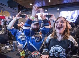 Seattle hockey fans celebrate after the announcement was made Tuesday that their city was getting an NHL franchise. (Image: Seattle Times)