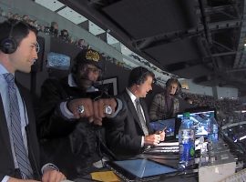 Rapper Snoop Dogg, center, shows off some bling as he joined Alex Faust, left, and Jim Fox in the television booth as an announcer at Saturdayâ€™s Los Angeles Kings game. (Image: Courtesy LA Kings)