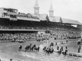 More than 70,000 fans watch horses hit the first turn at Churchill Downs in the 1945 Kentucky Derby. Pushed back to June 9 because of World War II restrictions, that Derby was the last time the Run for the Roses didn't run in May. (Image: AP File Photo)