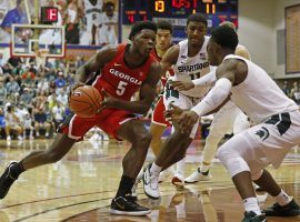 Georgia guard, Anthony Edwards, double-teamed by Michigan State in the Maui Classic. (Marco Garcia/AP)