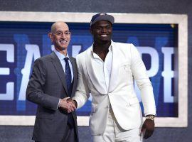 NBA commish Adam Silver congratulates Zion Williamson for becoming the #1 pick in the 2019 NBA Draft via the New Orleans Pelicans. (Image: Sarah Stier/Getty)