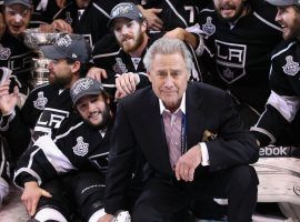 AEG founder Philip F. Anschutz poses with the team and the Stanley Cup after defeating the New Jersey Devils in Game Six of the 2012 Stanley Cup Finals at Staples Center on June 11, 2012 in Los Angeles, California. The Kings defeated the Devils 6-1 to win the series 4 games to 2.  (Image: Christian Petersen/Getty)