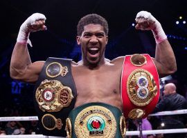 Anthony Joshua (pictured) and Tyson Fury are closing in on an August date for their heavyweight title unification bout. (Image: Getty)