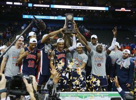 The Auburn Tigers celebrate their first trip to the Final Four with a victory over Kentucky in the Elite 8 in Kansas City, MO. (Image: Jay Biggerstaff/USA Today Sports)