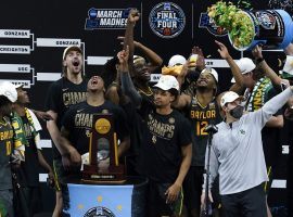 The Baylor Bears celebrate their first March Madness menâ€™s college basketball championship with a blowout victory over Gonzaga Bulldogs in Lucas Oil Stadium in Indianapolis, IN. (Image: AP)