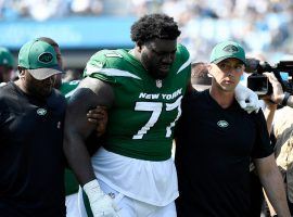 New York Jets offensive lineman Mekhi Becton exited the game in the third quarter against the Carolina Panthers due to a knee injury. (Image: Ricardo Hertz/Getty)