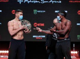 Vadim Nemkov (left) will defend his light heavyweight title against Phil Davis (right) in the main event of Bellator 257. (Image: @BellatorMMA/Twitter)