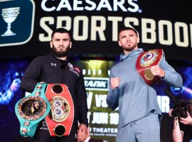 Artur Beterbiev (left) comes into his light heavyweight title unification bout as a heavy favorite over Joe Smith Jr. (right) on Saturday. (Image: Mikey Williams/Top Rank/Getty)