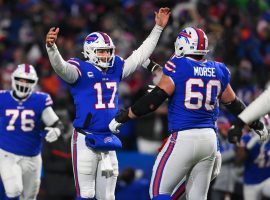 Josh Allen from the Buffalo Bills celebrates a touchdown during a blowout against the New England Patriots in the AFC Wild Card. (Image: USA Today Sports)